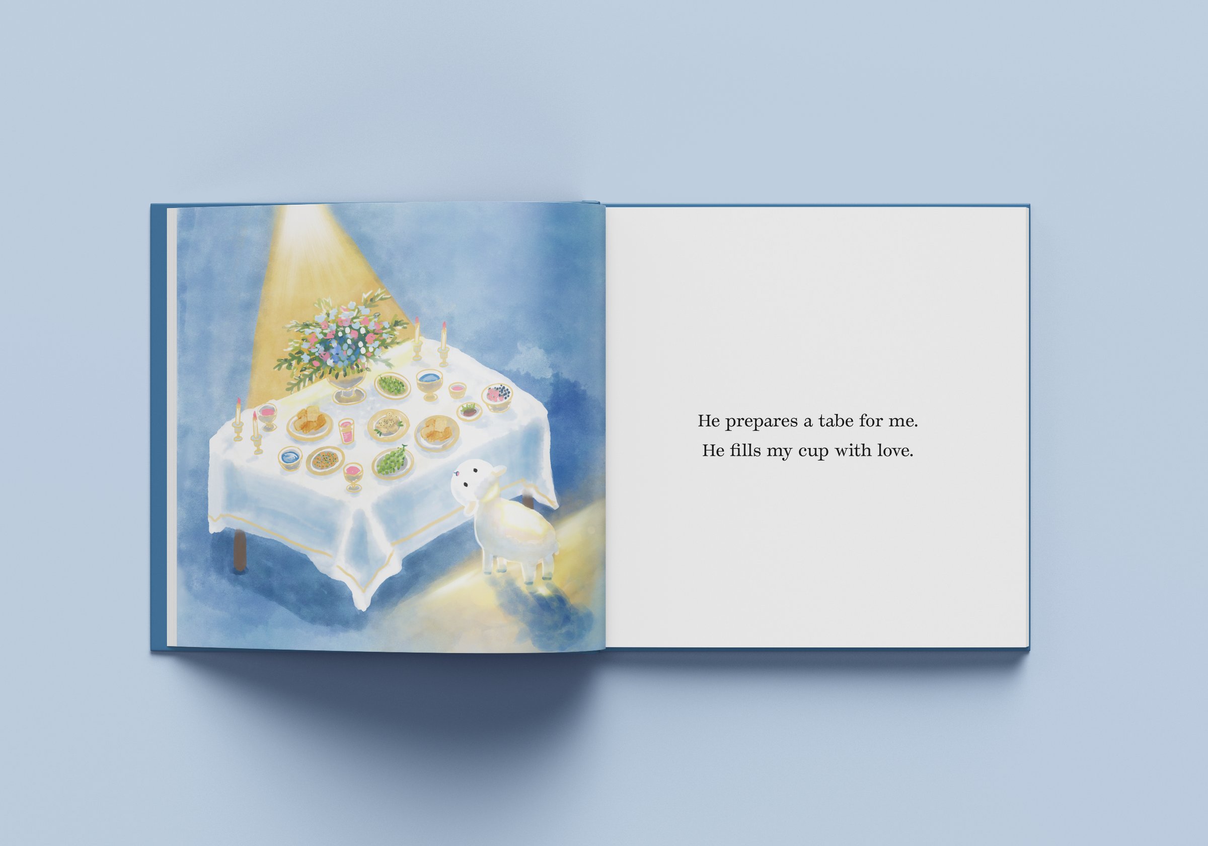 Open spread: a lit table laid with food and flowers and a lamb looking up, beside He prepares a table for me