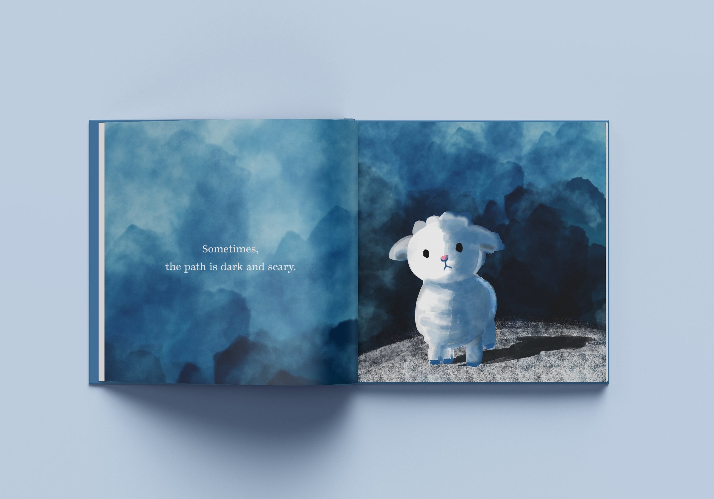Open spread: Sometimes the path is dark and scary, beside a small frightened lamb against deep blue clouds